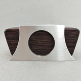 Silver metal engagement ring box with dark brown sliding wood insert