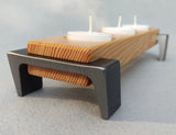 Light toned wooden tea light candle tray, 3 candle capacity, with dark metal angled legs on each end