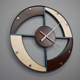 "Spiro" Wall Clock in Steel, Maple, and Cambia Maple