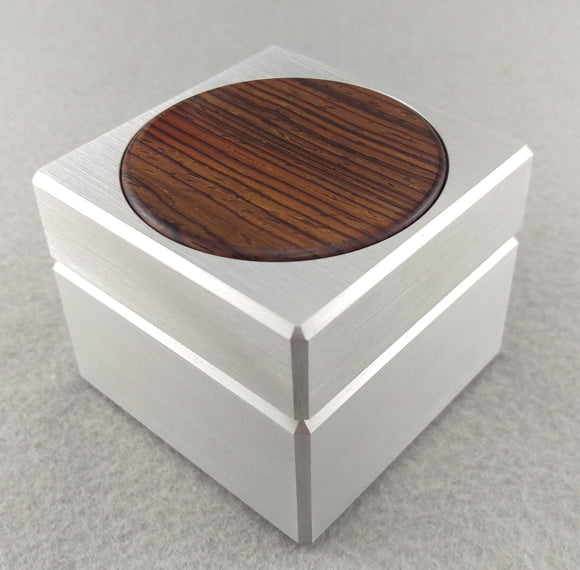 Silver aluminum engagement ring box, with circular cocobolo wood inlay on top of lid
