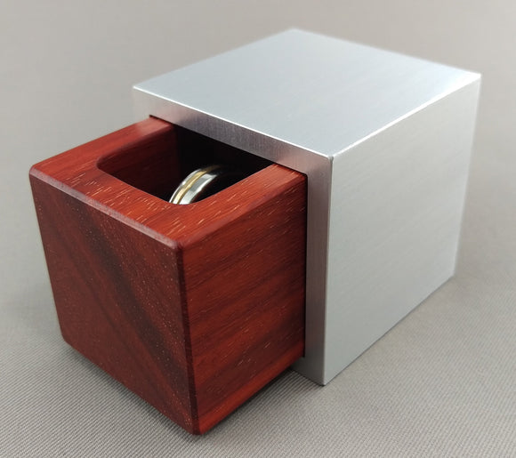 Cubed shaped engagement ring box with a red african padauk wood insert
