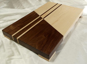 Wooden cutting board, one half dark walnut, one half white maple